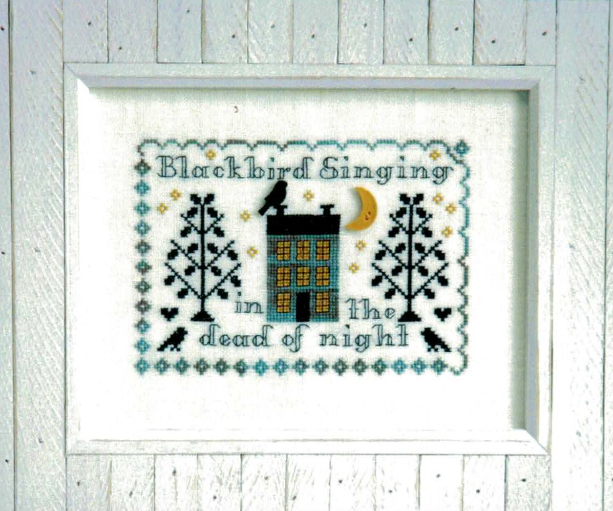 Blackbird Singing cross stitch pattern from Tiny Modernist TM-BLA
