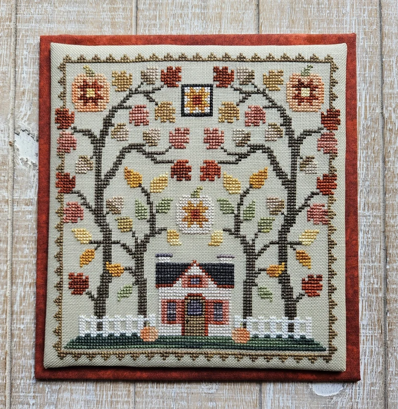 Little House in the Autumn Woods cross stitch pattern from Waxing Moon Designs WMD-225