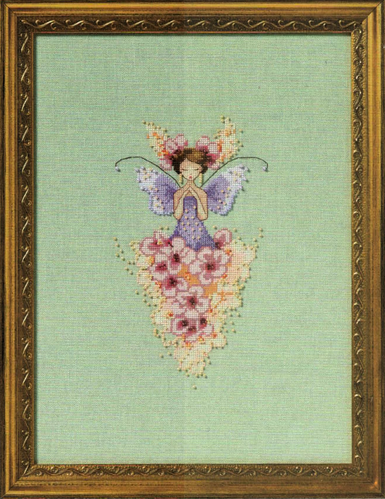 Miss Apple Blossom cross stitch pattern from Nora Corbett NC-379